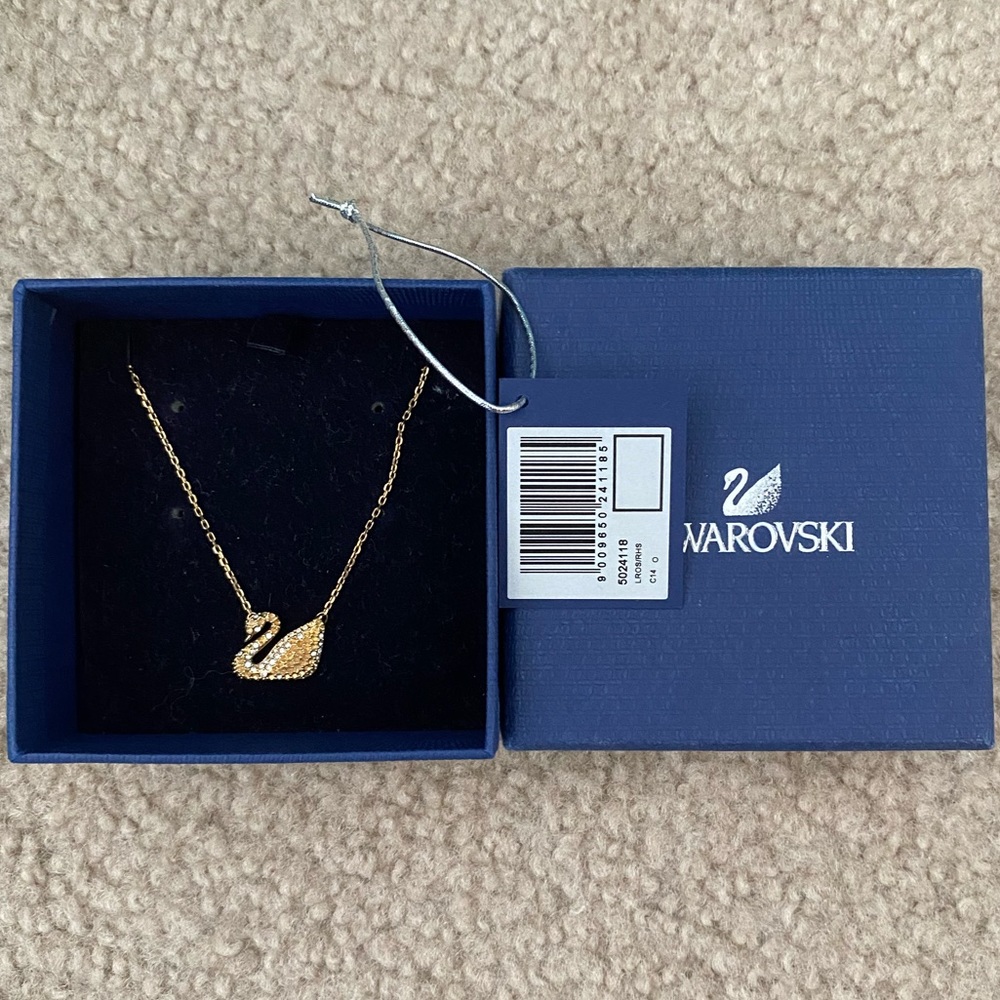 Swarovski iconic gold plated swan pendant necklace
